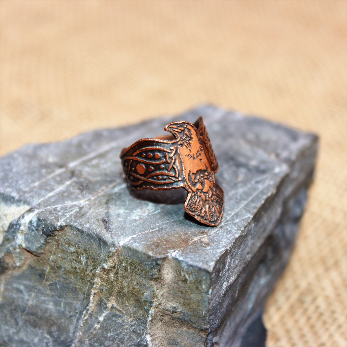 Copper raven ring cutout