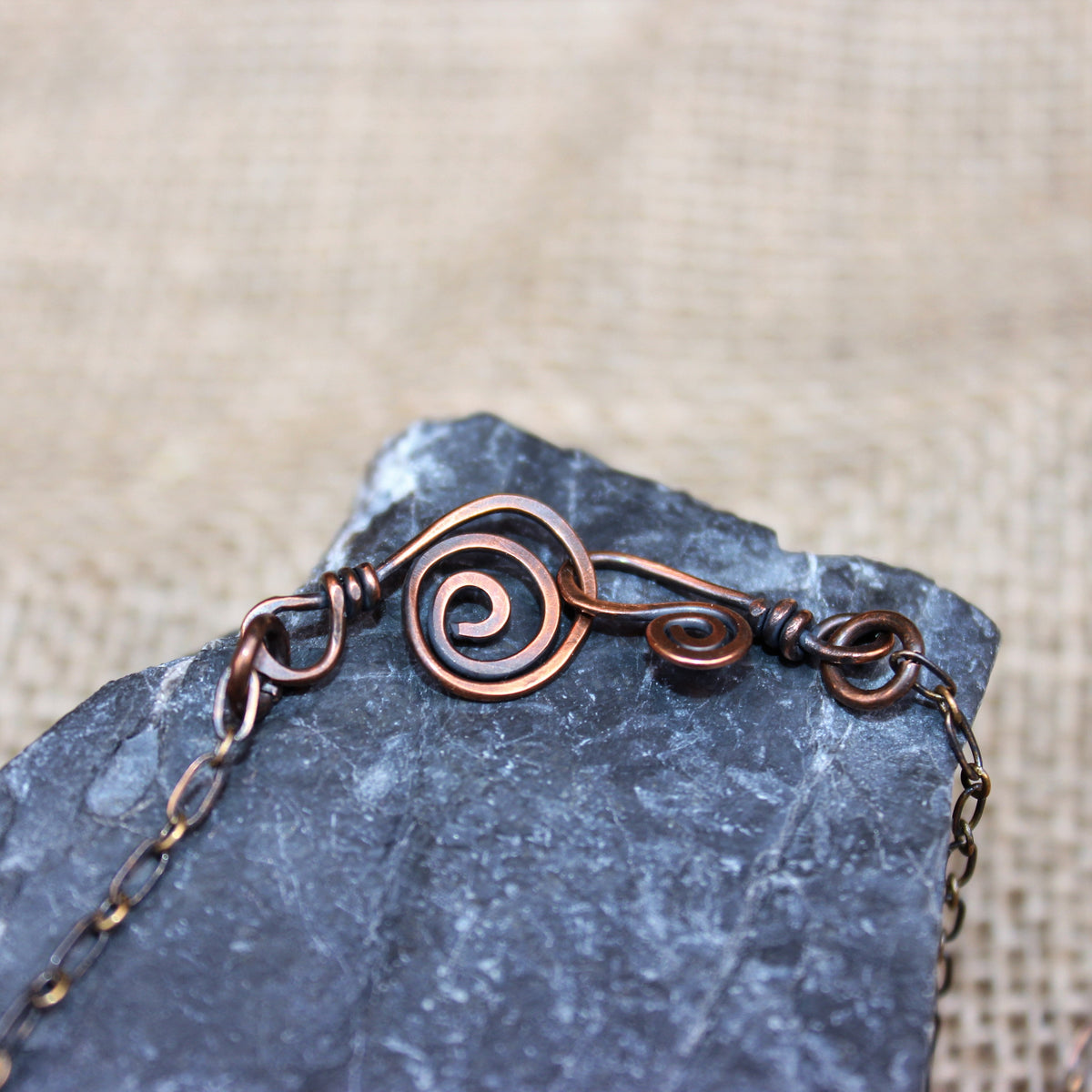 Copper raven pendant