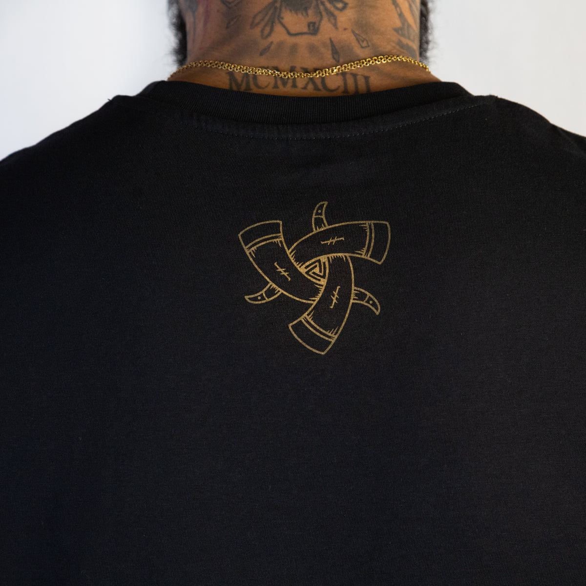 Back of Black T shirt with Horns of Odin Logo on neck
