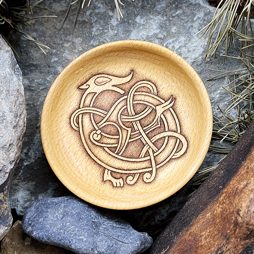 Wooden offering bowl with Urnes-style decor