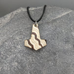 Buffalo Bone Snake Medicine Mjolnir Pendant on black leather thong